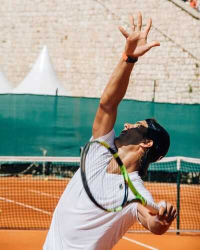 Rafael Nadal serving tennis shots